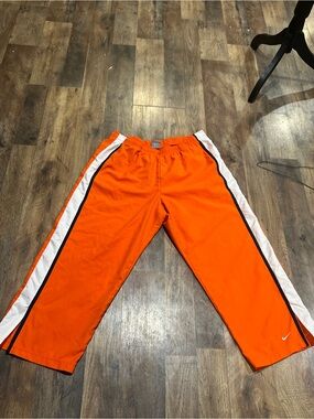 Nike Kids Bright Orange Track Pants with White & Black Side Stripes